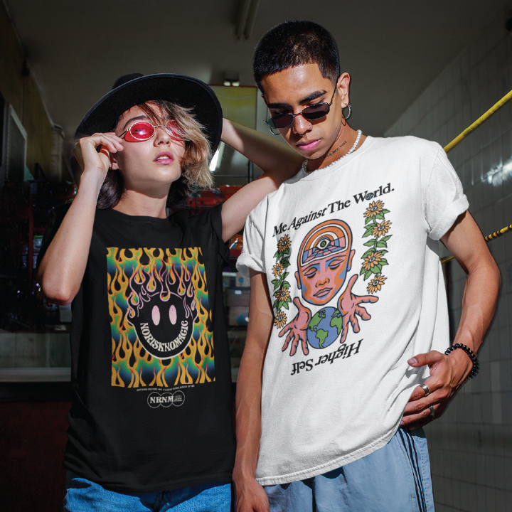Two people wearing zdropped graphic t-shirts with unique designs in an urban setting.