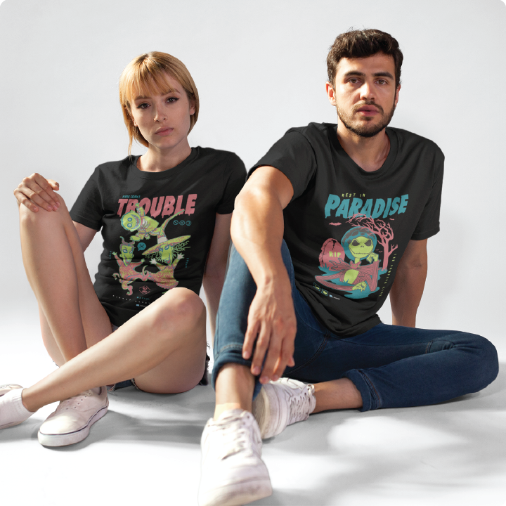 A young woman and man pose wearing the z dropped pumpkin king collection