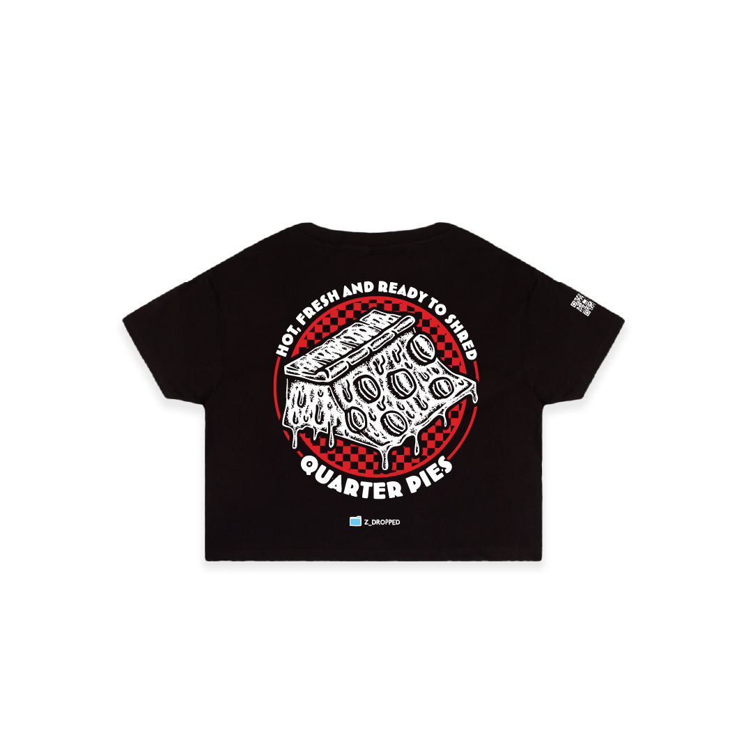 Rear view of a women crop top with a red line-art pizza slice graphic and the text “Hot, Fresh and Ready to Shred – Quarter Pies” printed on the front on a white background. 