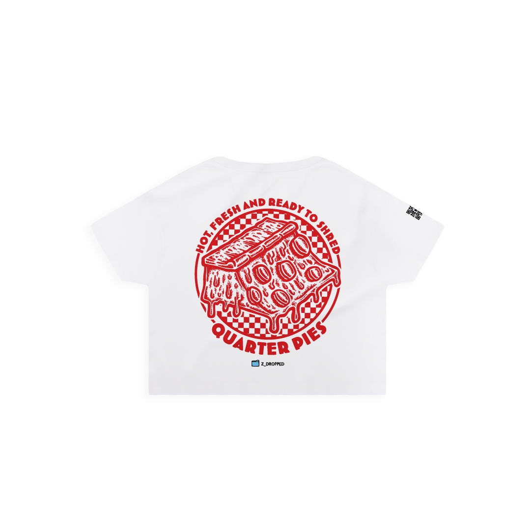 Rear view of a women crop top with a red line-art pizza slice graphic and the text “Hot, Fresh and Ready to Shred – Quarter Pies” printed on the front on a white background. 
