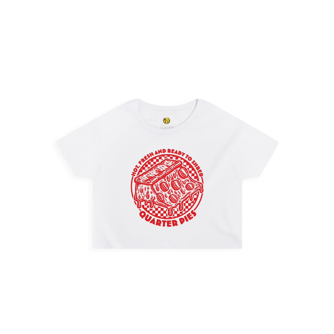Front view of a women crop top with a red line-art pizza slice graphic and the text “Hot, Fresh and Ready to Shred – Quarter Pies” printed on the front on a white background.