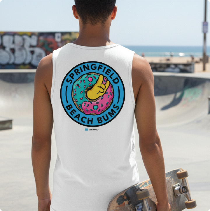 skater wearing a white 'Springfield Beach Bums' tank top at a beach skatepark.