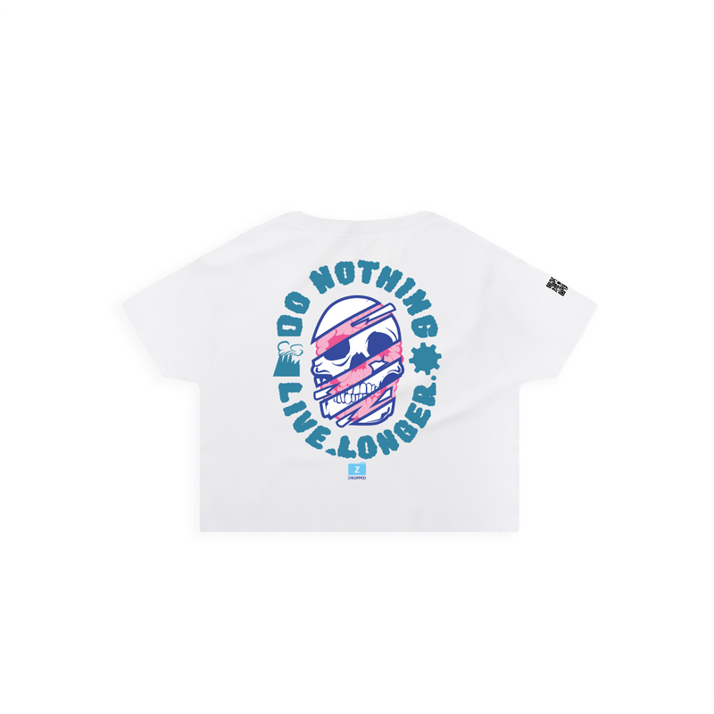 Rear view of a white crop top with 'DO NOTHING LIVE LONGER' text along with a graphic of a skull in blue and pink colors on the front.