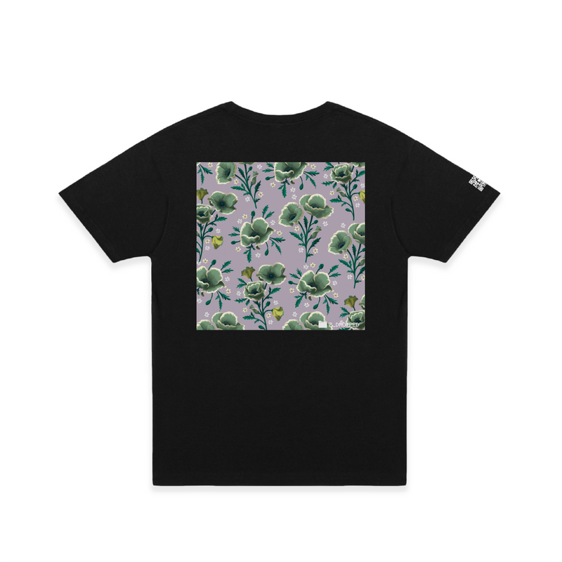 Rear view of a unisex black shirt with a large lavender floral poppy repeat pattern on a white background.