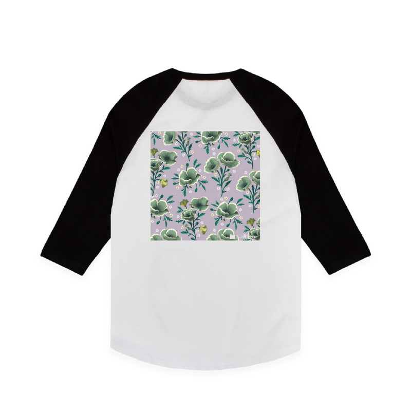Rear view of a black and white baseball raglan shirt with a large lavender floral design on a white background