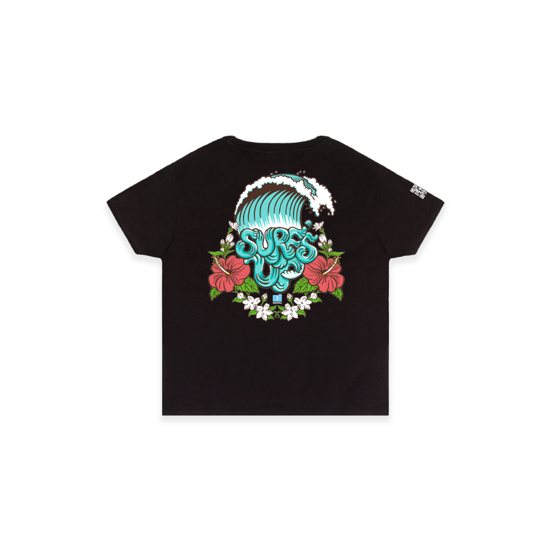 Rear view of a womens high waisted black t-shirt with a colorful graphic design on the back featuring text and floral elements.