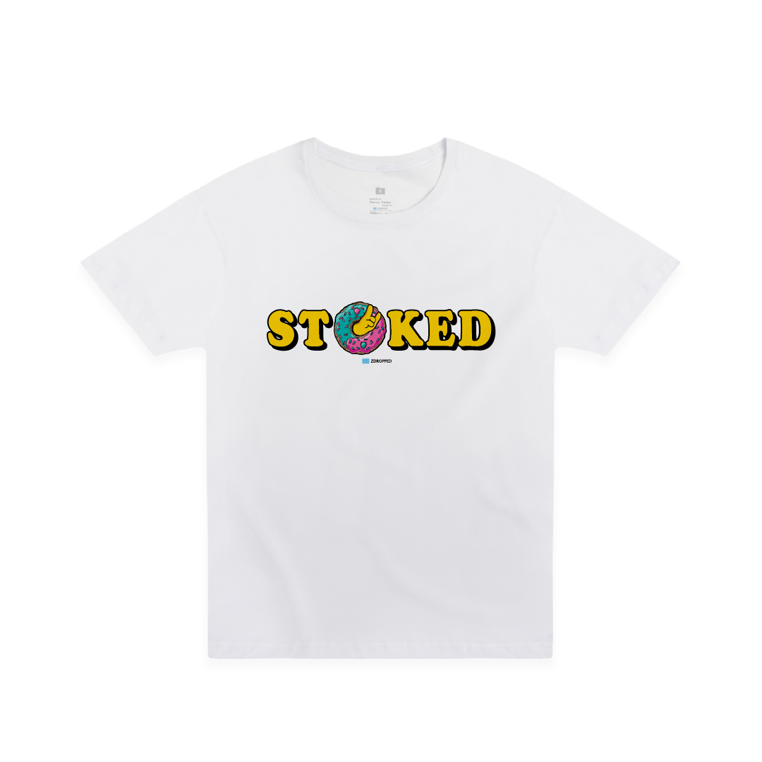 Front view of a white t-shirt with the word 'STOKED' in yellow with a colorful sprinkle donut. 