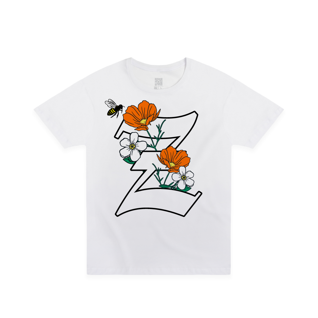 Front view of a white t-shirt with a large California poppy and 'Z' design on a white background