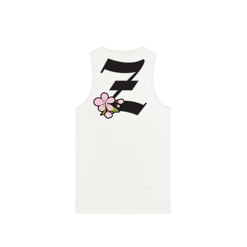 Rear view of a white unisex tank top with a large black 'Z' logo and pink cherry blossom flower on a white background.