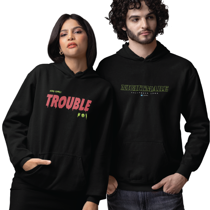 Two people wearing black hoodies with text designs on a white background