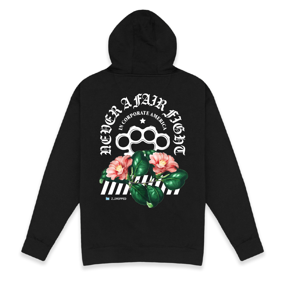 Rear view of a Black hoodie with brass knuckle and floral design with white Never a Fair Fight text on the back against a white background