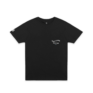 Front view of a black unisex t-shirt with white start living your life text on a white background