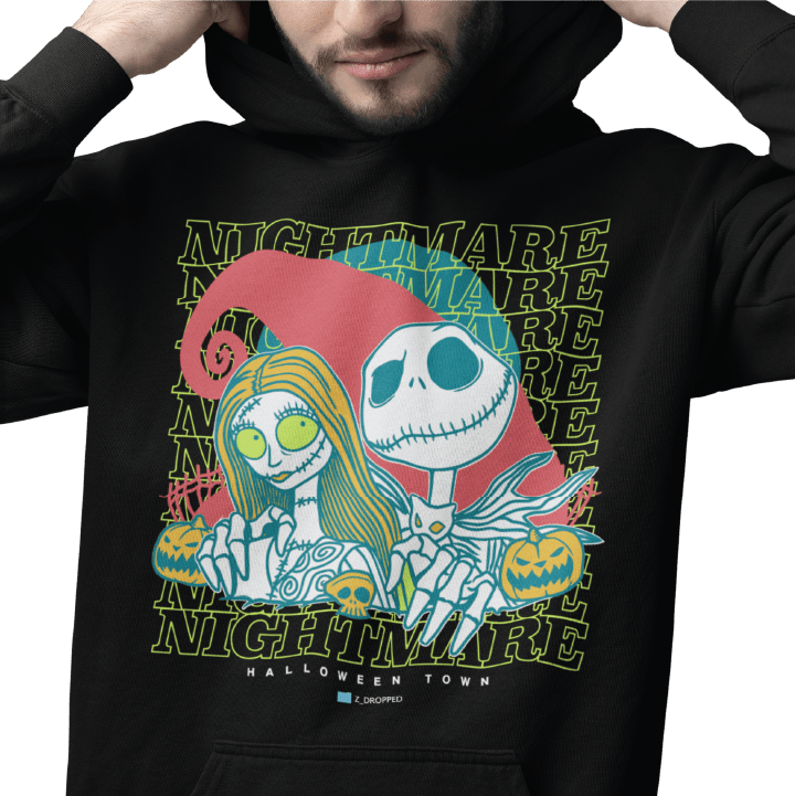 Young man wearing a black hoodie with 2 cartoon skeletons and 'Nightmare' text.