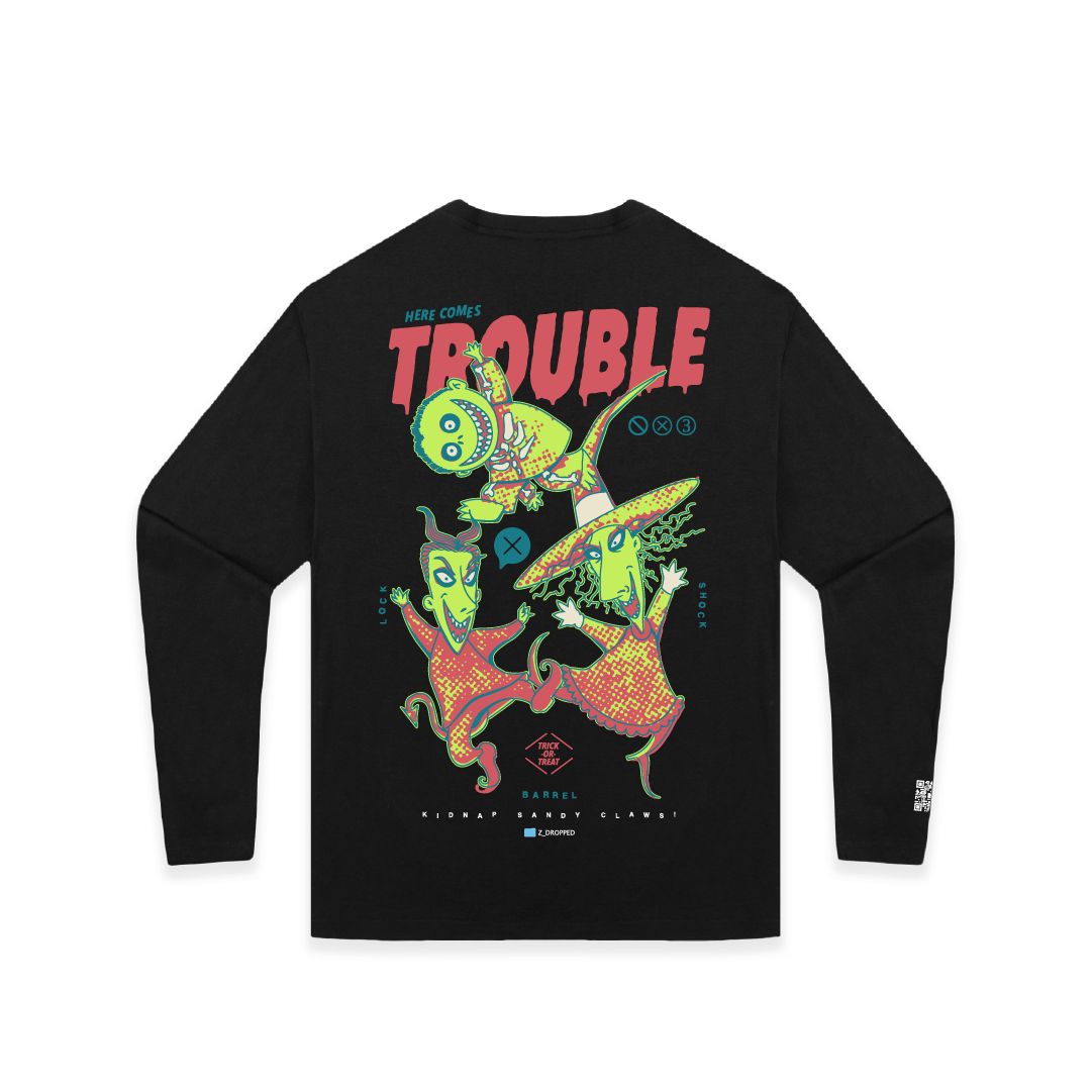 Front view of a black long sleeve with colorful lock shock and barrel and 'Here Comes Trouble' text on a white background