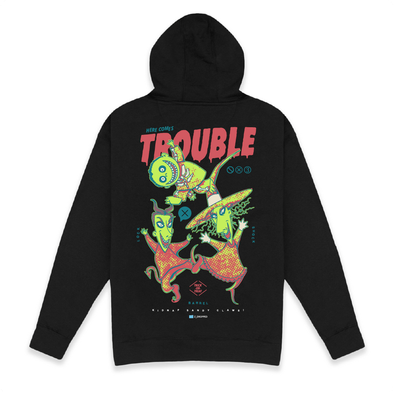 Rear view of a unisex black hoodie with colorful lock shock and barrel and 'Here Comes Trouble' text on a white background