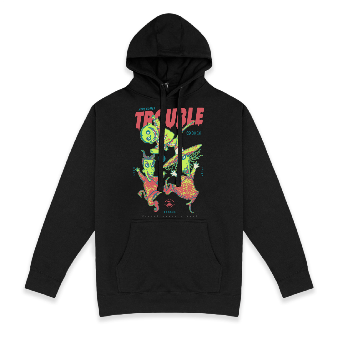 Front view of a black hoodie with colorful lock shock and barrel and 'Here Comes Trouble' text on a white background