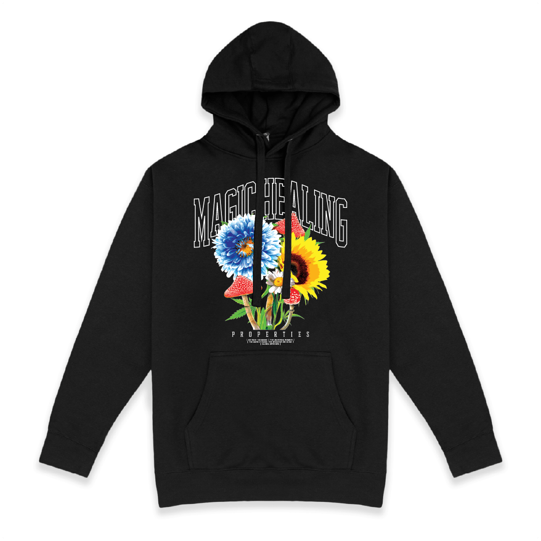 Front view of a unisex black hoodie with floral design and Magic Healing text on a white background