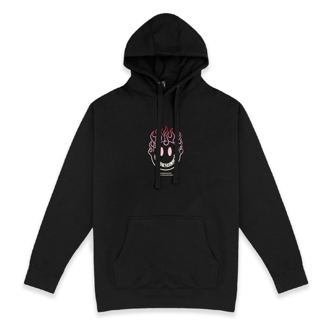 Front view of a unisex black hoodie with a small red flaming smiley face graphic center on the chest on a white background