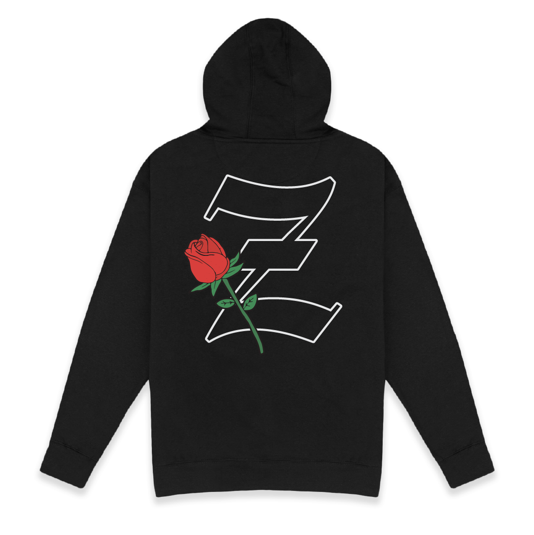 Rear view of a black hoodie with a red rose and white Z logo on the back against a white background
