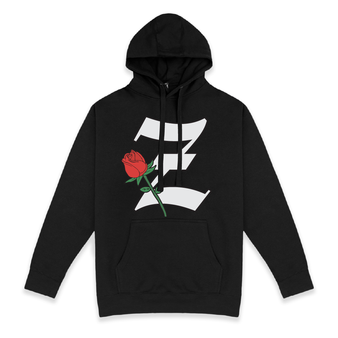 Front view of a black hoodie with a white z and red rose on a white background