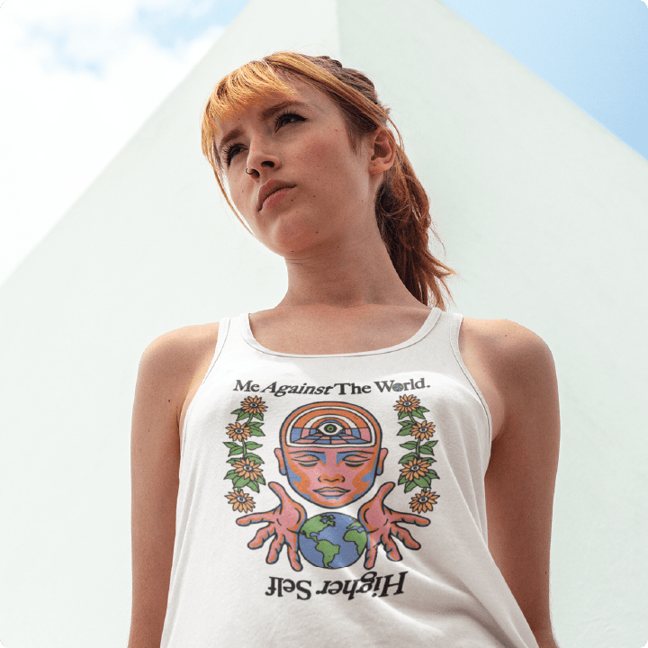 Person wearing a white racer back tank top with a zdropped graphic and text.