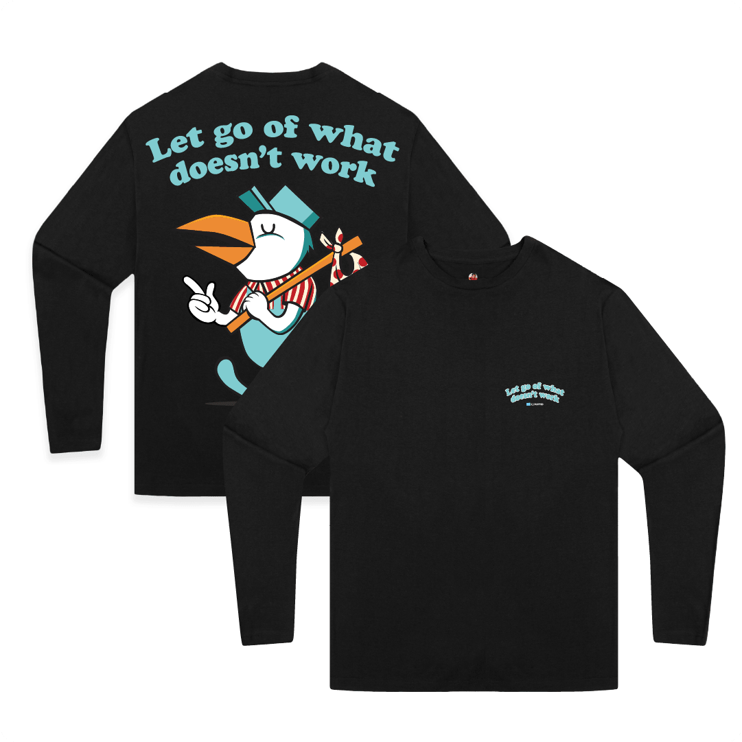 Front and rear view of a unisex black long sleeve shirt with a large cartoon pelican bird and 'Let go of what doesn't work' text on the front chest pocket.