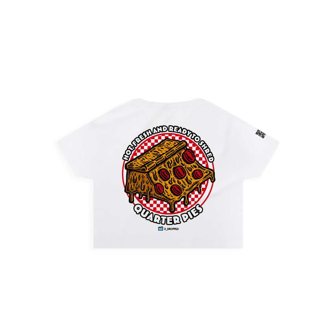 Front view of a women crop top  with a colorful illustrated pizza slice graphic and the text “Hot, Fresh and Ready to Shred – Quarter Pies” on the front on a white background. 