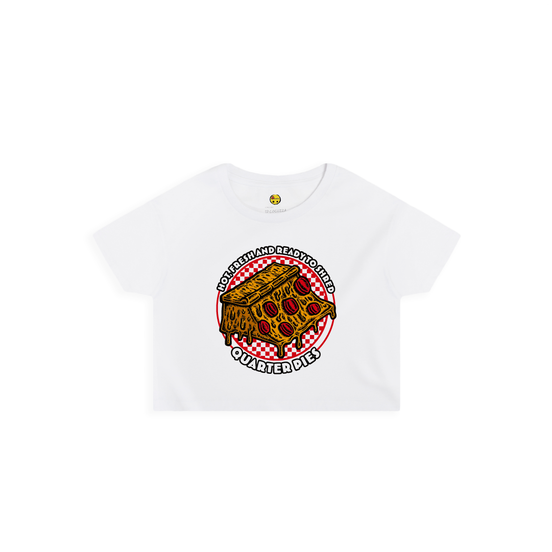 Front view of a women crop top  with a colorful illustrated pizza slice graphic and the text “Hot, Fresh and Ready to Shred – Quarter Pies” on the front on a white background. 