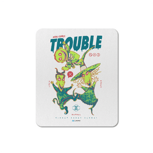 White mouse pad with cartoon characters and 'Here Comes Trouble' text on a white background
