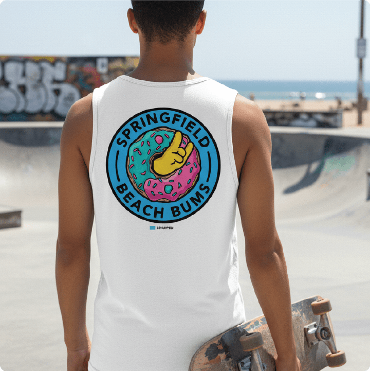 skater wearing a white 'Springfield Beach Bums' tank top at a beach skatepark.