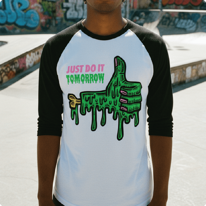 Person wearing a black and white baseball shirt with a green thumbs up graphic and text in an urban setting.
