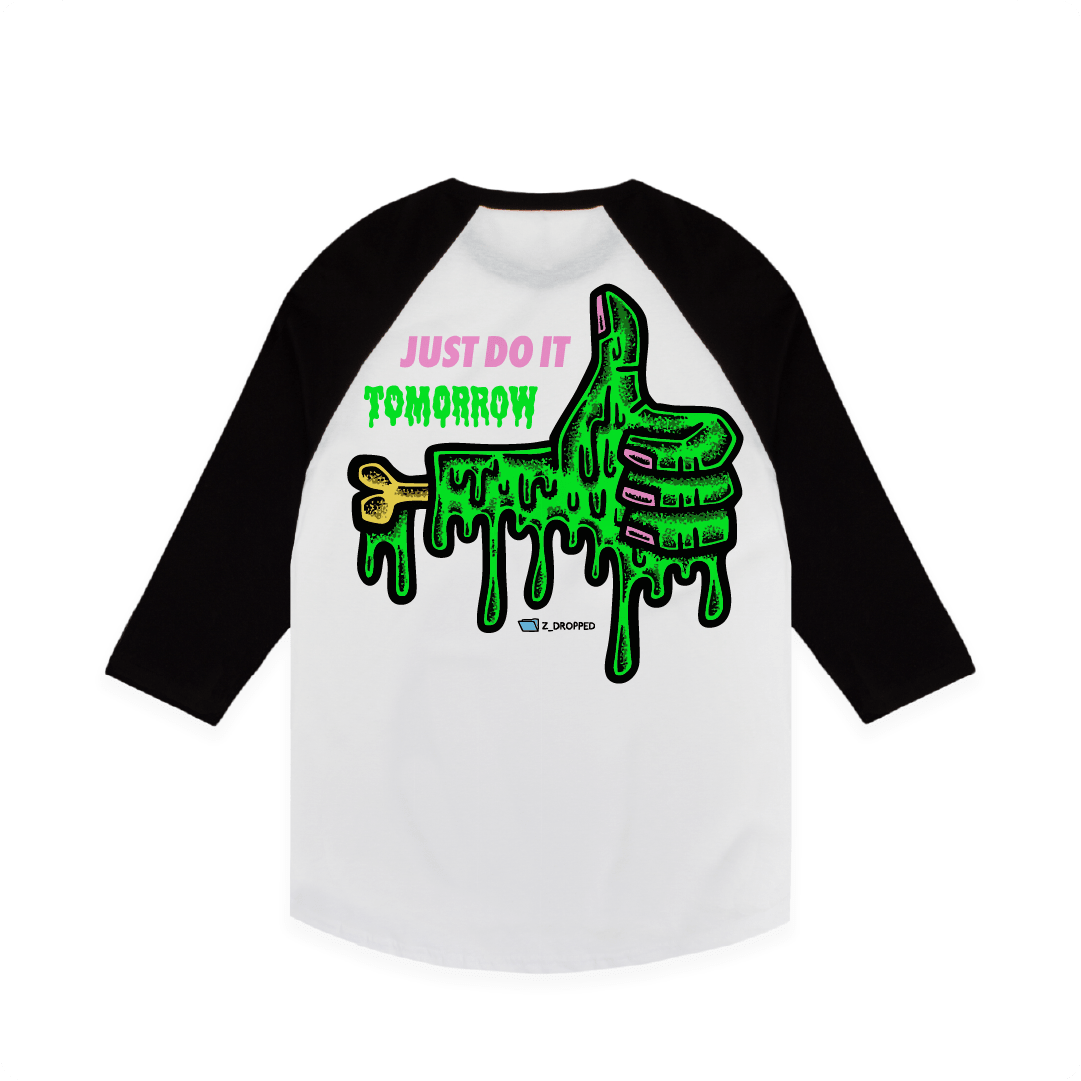 White rear view of a unisex raglan with a dripping green thumb-up graphic and bold text ‘JUST DO IT TOMORROW’ on the front on a white background