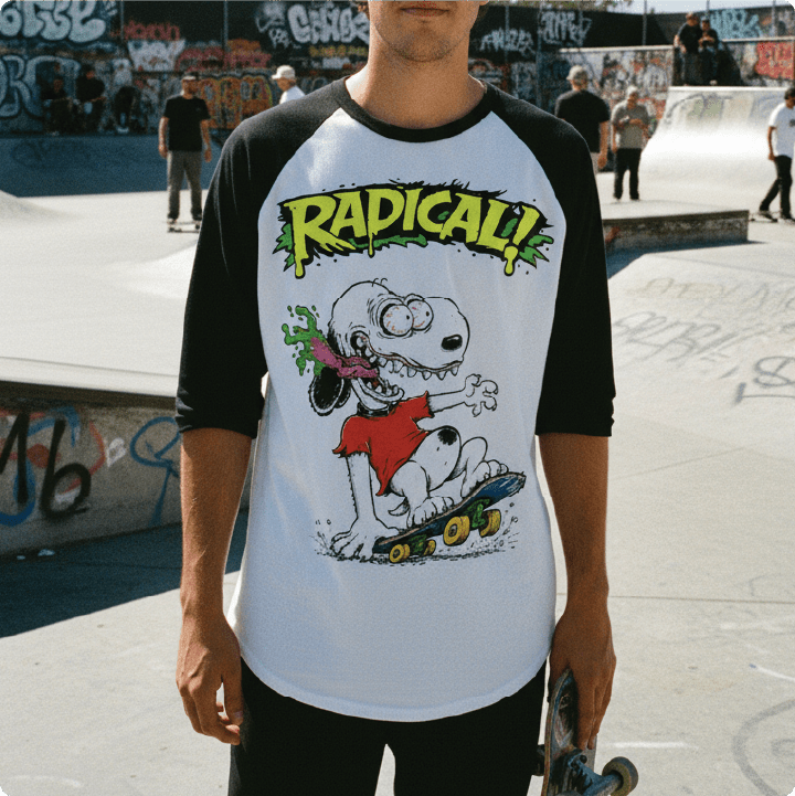 Person wearing a t-shirt with a snoopy rat fink cartoon character and 'Radical!' text at a skate park.