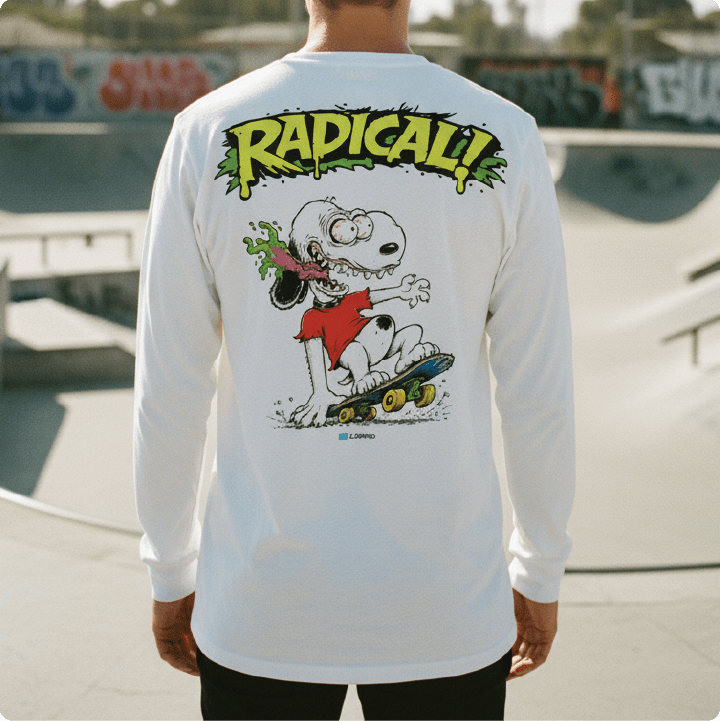 Person wearing a white long sleeve shirt with a snoopy fink graphic design and 'RADICAL!' text at a skate park.