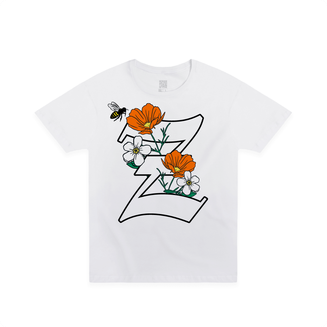 Front view of a white t-shirt with a large California poppy and 'Z' design on a white background