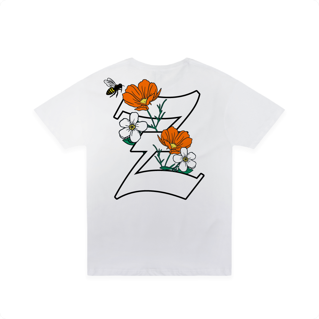 Rear view of a white t-shirt with a large California poppy and 'Z' design on a white background
