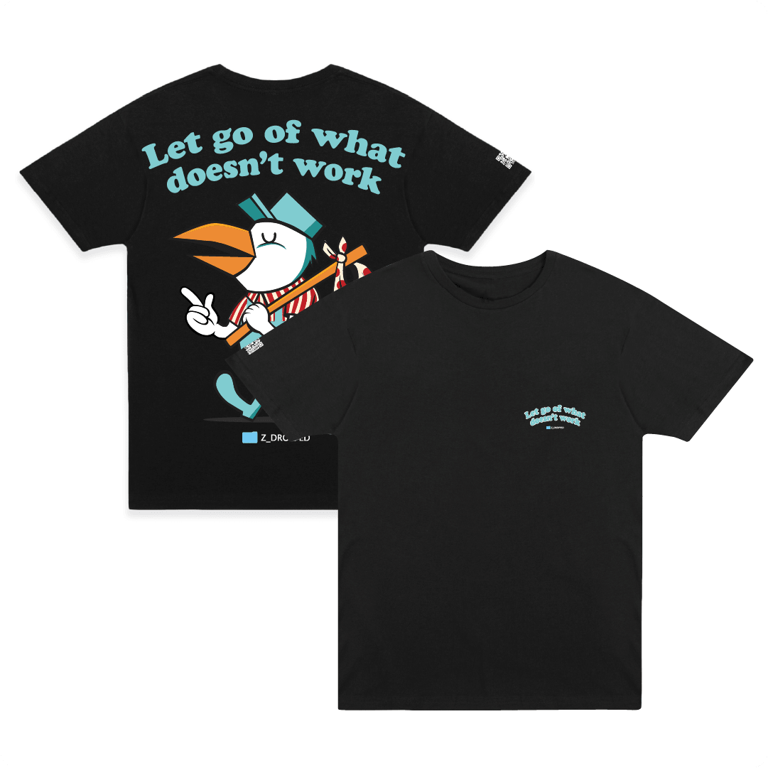 Front and rear view of a black shirt with a large cartoon pelican bird and blue 'let go of what doesn't work' text.