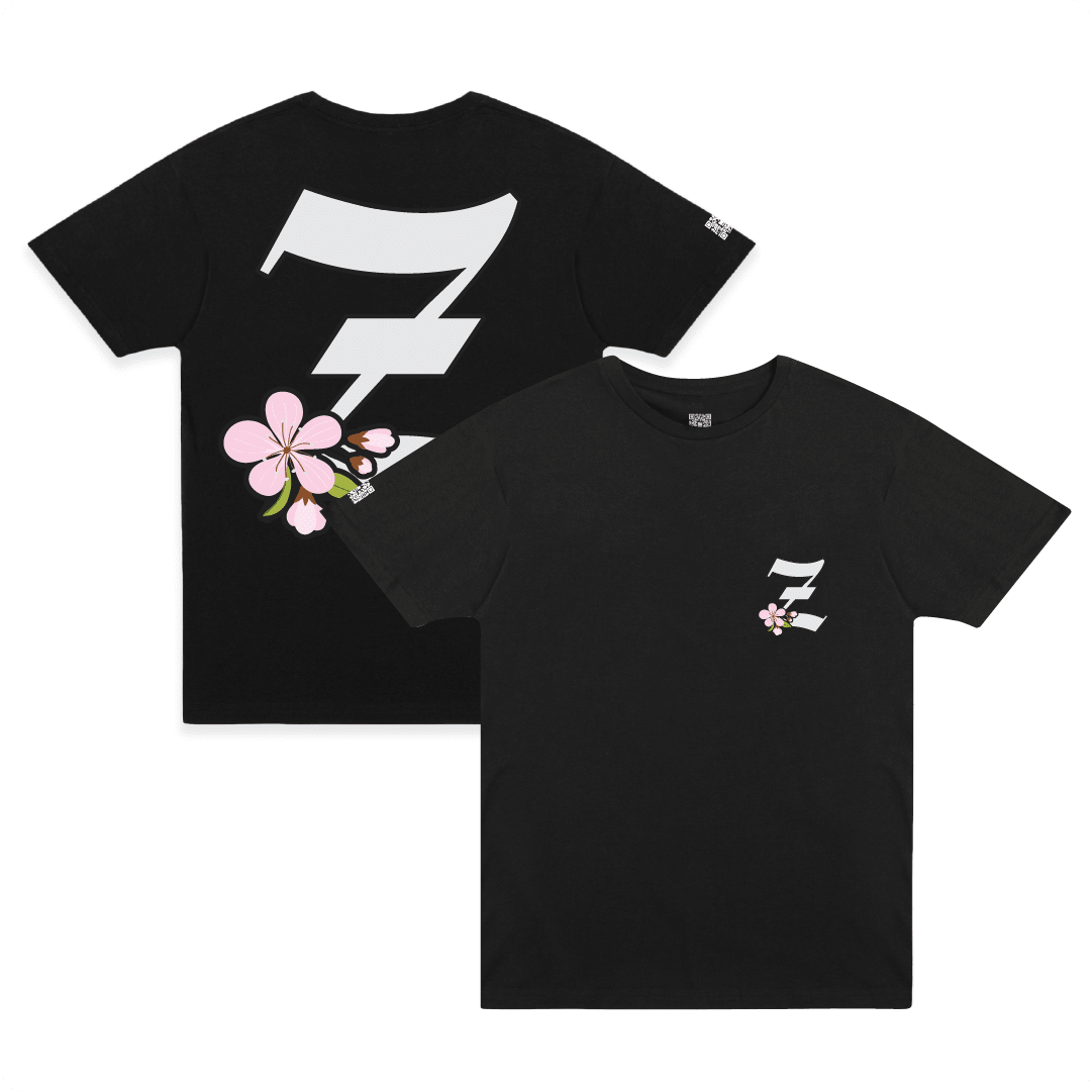 Front and rear view of a black unisex t-shirt with a large white 'Z' logo and pink cherry blossom flower on a white background.