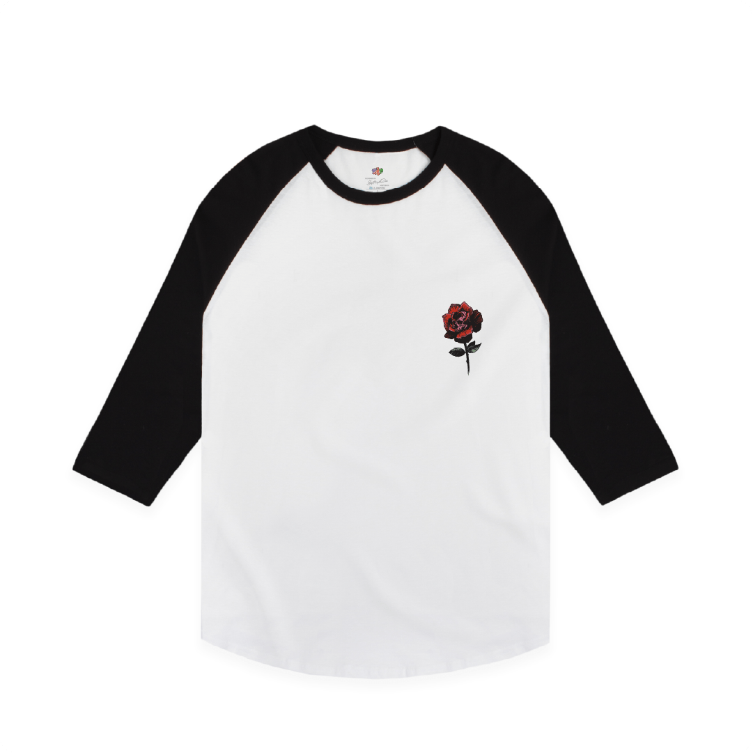 White baseball shirt with black sleeves and a red rose graphic on a white background