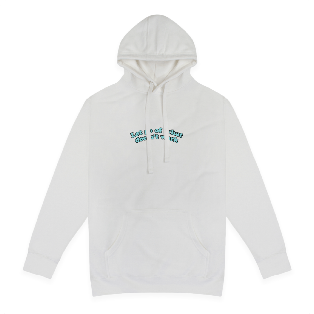 Front view of a white hoodie with Let Go Of What Doesn't Work text on a white background