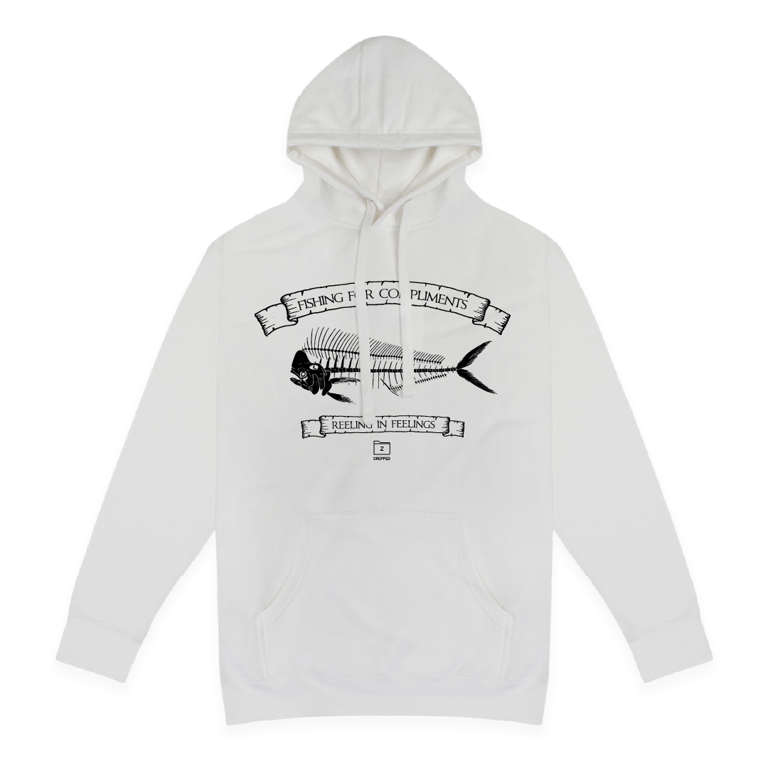 Front view of a unisex white hoodie with large black mahi bones graphic on a white background with black text that reads "I'm the catch of the day" on the top of the fish graphic and "fishing for compliments" in black text below the graphic