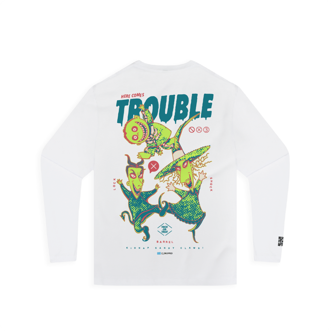 Rear view of a white long sleeve with colorful lock shock and barrel and 'Here Comes Trouble' text on a white background