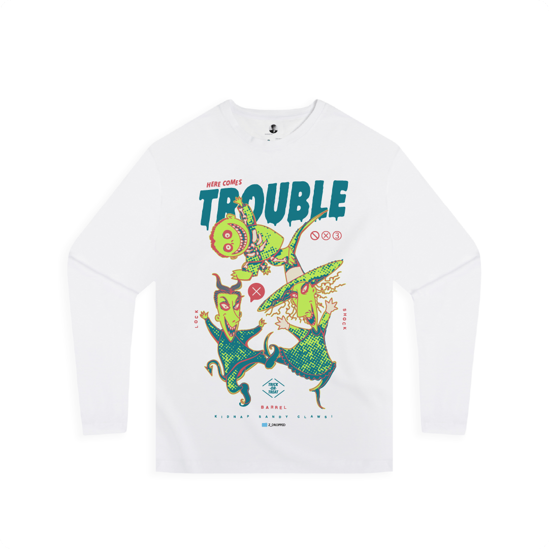 Front view of a white long sleeve with colorful lock shock and barrel and 'Here Comes Trouble' text on a white background