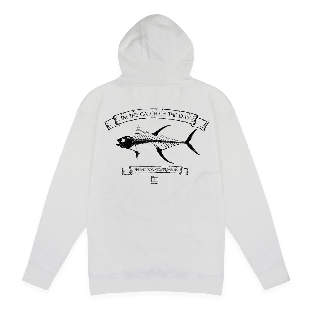 Rear view of a unisex white hoodie with large black tuna bones graphic on a white background with black text that reads "I'm the catch of the day" on the top of the fish graphic and "fishing for compliments" in black text below the graphic