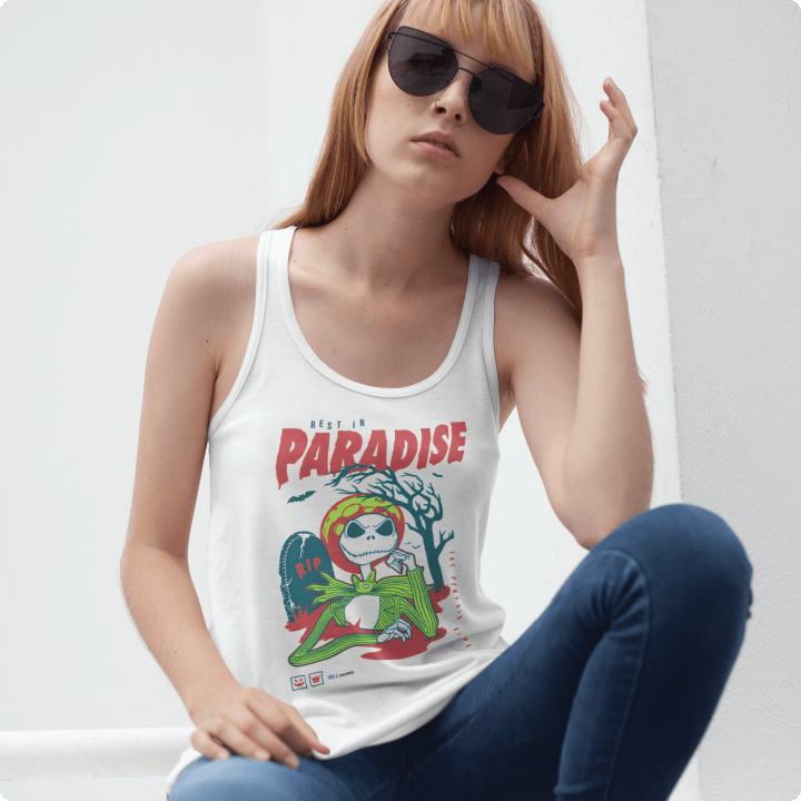 Young women weating a white tank top with a skeleton and 'Rest in Paradise' text.