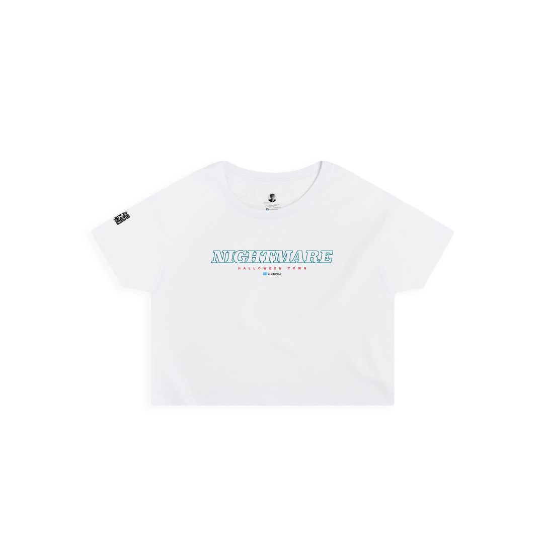 Front view of a womens white crop top with neon blue 'NIGHTMARE' text centered on a white background.