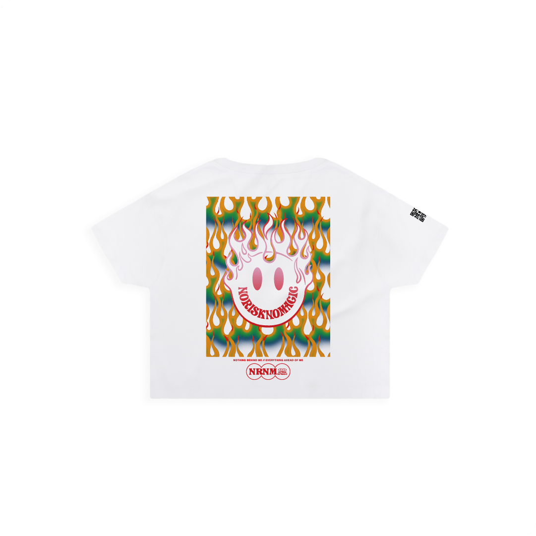 White t-shirt with colorful flames and smiley face graphic on a white background