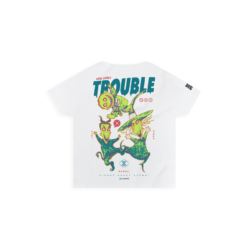 Rear view of a white high waisted tee with colorful lock shock and barrel and 'Here Comes Trouble' text on a white background
