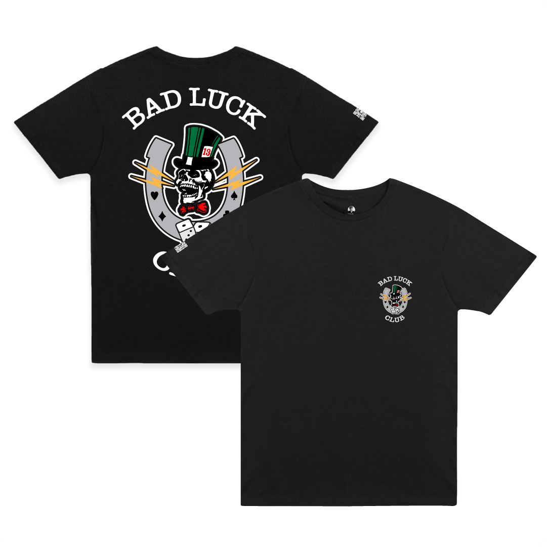 Front and rear view of a unisex black crew neck t-shirt with white 'BAD LUCK CLUB' text and a large graphic including a laughing skull, dice, and lightning bolts on a white background.