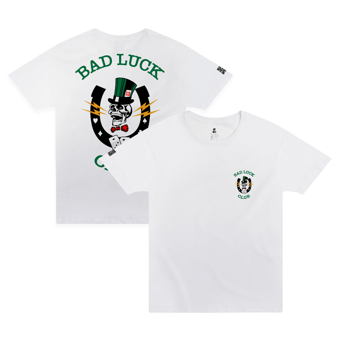 Front and rear view of a white shirt with green 'BAD LUCK CLUB' text and a large graphic including a laughing skull, dice, and lightning bolts on a white background.